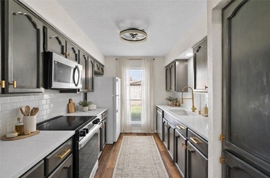 Welcome to this beautifully updated end-unit townhouse in the - photo 4