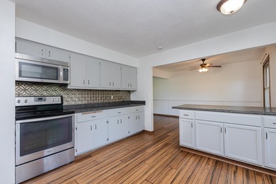 Enjoy the perfect blend of space, updates, and location on this - photo 4