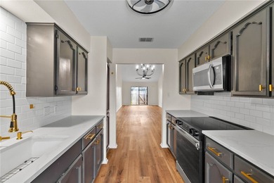 Welcome to this beautifully updated end-unit townhouse in the - photo 5