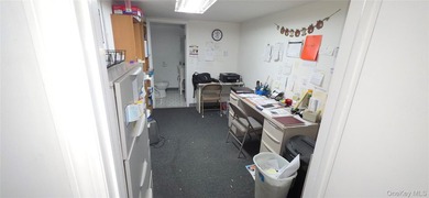 Two story mixed-use property featuring a 1300 sq ft. ground - photo 10