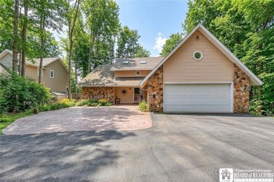 Set on a secluded lot with incredible views of Chautauqua Lake - photo 1