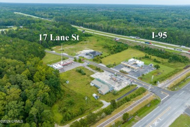 Prime location! Building in place with a new roof with gas tanks