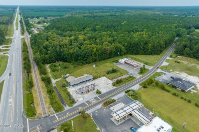 Prime location! Building in place with a new roof with gas tanks