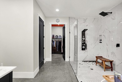 This exceptional 2-year-old barndominium offers modern country