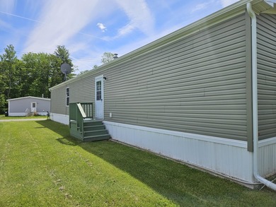 Tucked away at the end of the street in a mobile home park, this - photo 19
