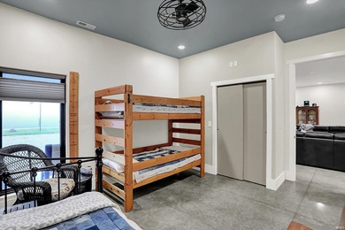 This exceptional 2-year-old barndominium offers modern country