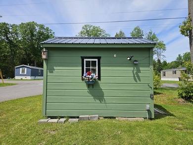 Tucked away at the end of the street in a mobile home park, this - photo 21