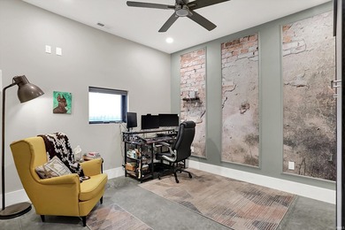 This exceptional 2-year-old barndominium offers modern country