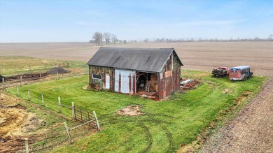 This exceptional 2-year-old barndominium offers modern country