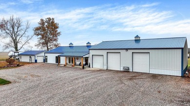This exceptional 2-year-old barndominium offers modern country