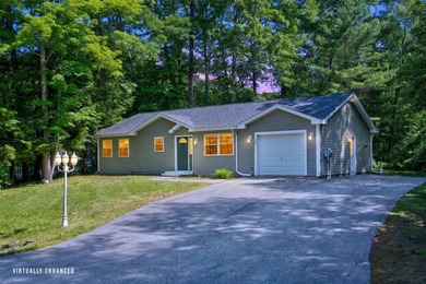 Quality-built and low maintenance, this charming two-bedroom - photo 1