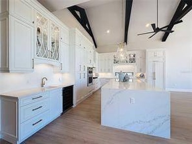 Located at 7394 Gathering Court within the exclusive gates of - photo 11