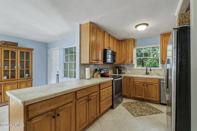 Nestled on 1.48 private acres in the exclusive waterfront - photo 18