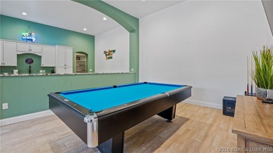 Welcome to a one-of-a-kind luxury estate in a gated Osage Beach - photo 18