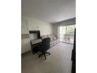 Bright and clean 2/1.5 CORNER condo located on the 2nd floor in - photo 12