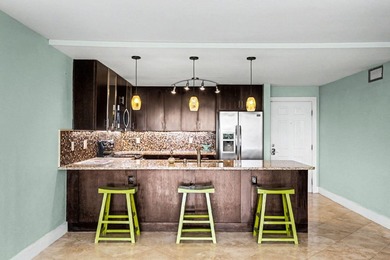Wake up to shimmering harbor views and effortless coastal - photo 16