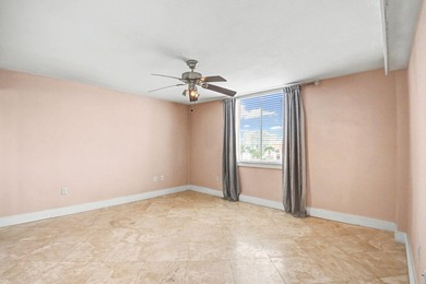 Wake up to shimmering harbor views and effortless coastal - photo 17