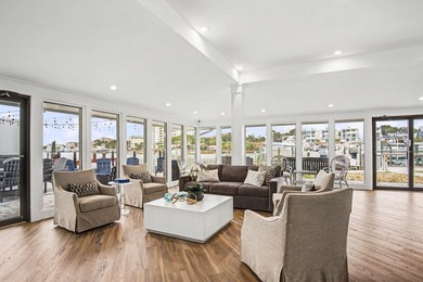 Wake up to shimmering harbor views and effortless coastal - photo 43