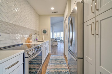 Wake up to shimmering harbor views and effortless coastal - photo 46
