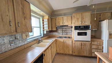 Welcome to this spacious 2-bedroom, 2-bath corner condo located - photo 3