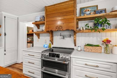 A beautifully remodeled farmhouse situated on 13.39 private - photo 11