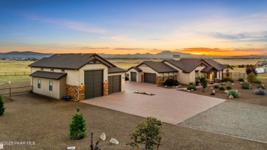 Outdoor living takes center stage in this exceptional custom