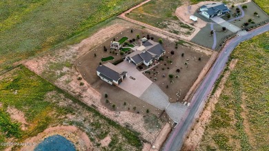 Outdoor living takes center stage in this exceptional custom