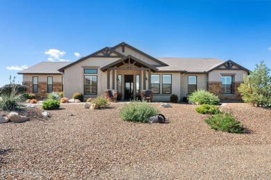 Outdoor living takes center stage in this exceptional custom