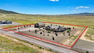 Outdoor living takes center stage in this exceptional custom