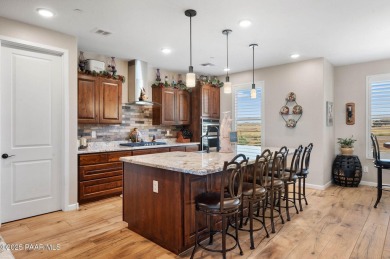 Outdoor living takes center stage in this exceptional custom