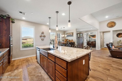 Outdoor living takes center stage in this exceptional custom