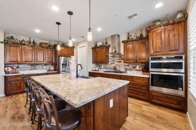 Outdoor living takes center stage in this exceptional custom