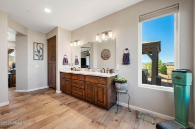 Outdoor living takes center stage in this exceptional custom