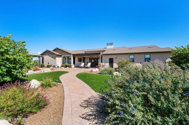 Outdoor living takes center stage in this exceptional custom