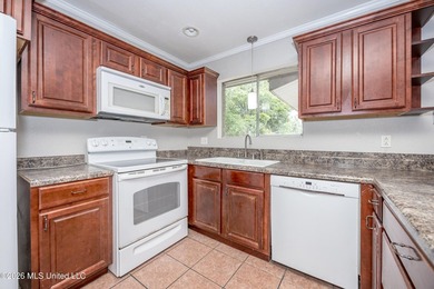 Located in Ocean Springs' desirable Golf Cart District, this - photo 18