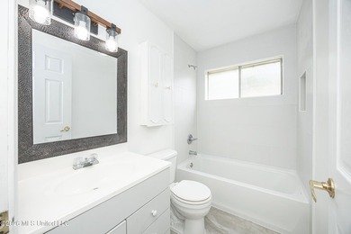 Located in Ocean Springs' desirable Golf Cart District, this - photo 30