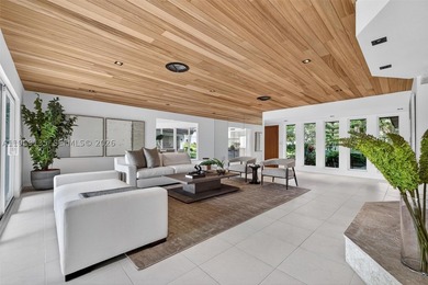 Nestled within the prestigious gated community of Gables by the - photo 6