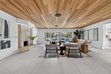 Nestled within the prestigious gated community of Gables by the - photo 7