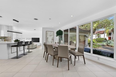 Nestled within the prestigious gated community of Gables by the - photo 8