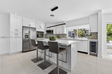 Nestled within the prestigious gated community of Gables by the - photo 9