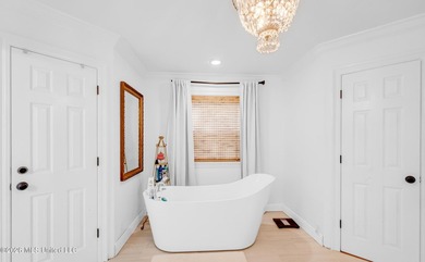 Custom Acadian Masterpiece on Private Corner Lot in Coveted - photo 14
