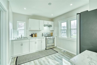Step into modern comfort in this beautifully updated colonial - photo 4