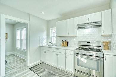 Step into modern comfort in this beautifully updated colonial - photo 5