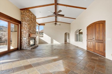 Tucked behind a gated entrance and accessed by a private drive