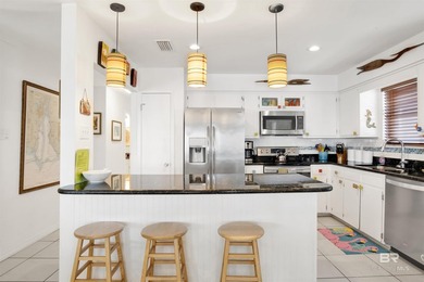 Discover the perfect coastal retreat in this stunning 4-bedroom - photo 8