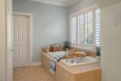Set on a generous, level homesite overlooking a tranquil lagoon - photo 39