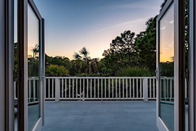 Set on a generous, level homesite overlooking a tranquil lagoon - photo 59