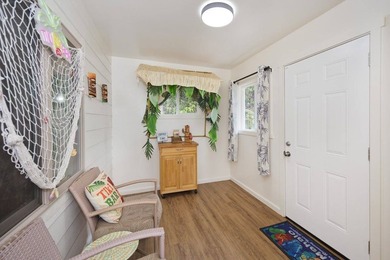 Cottage-style home on approximately 1/4 acre in a forested - photo 12