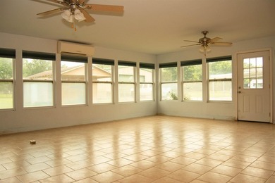 This 3/2/2 home offers incredible potential and plenty of space - photo 5