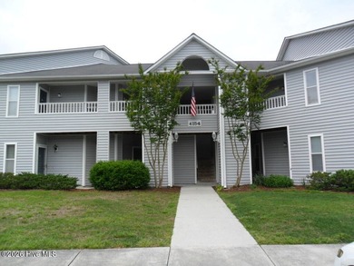 Offering this spacious 2 bedroom, 2 bath second-floor condo in - photo 3